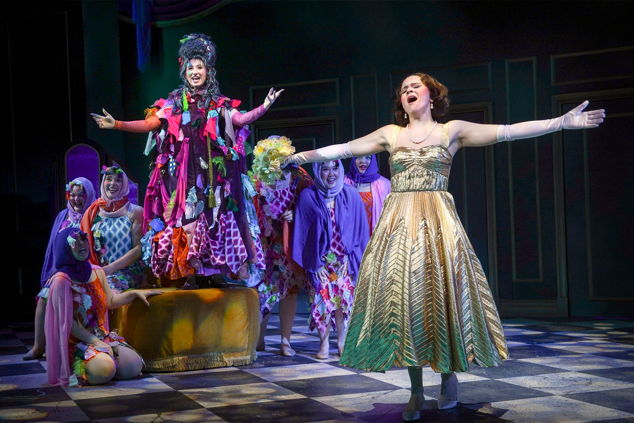 Brightly costumed CCM Opera students sing together in CCM's Fall 2025 production of  "Cendrillon." Photo/Mark Lyons