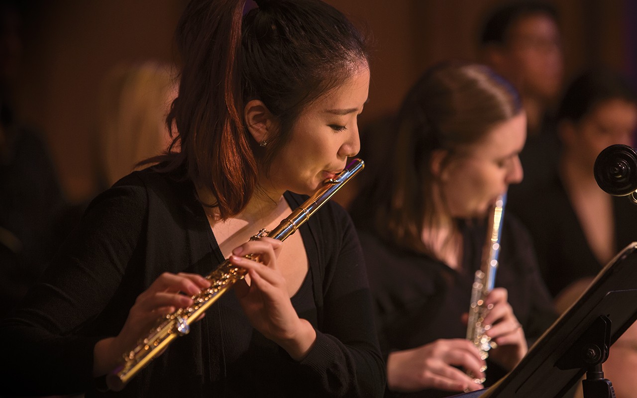 Two female students perform on the flute during a perfromance of Bach's St. Matthew Passion