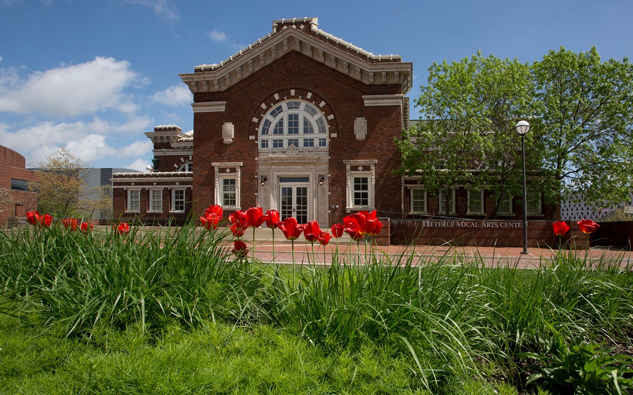 Flowers bloom in front of CCM during the summer