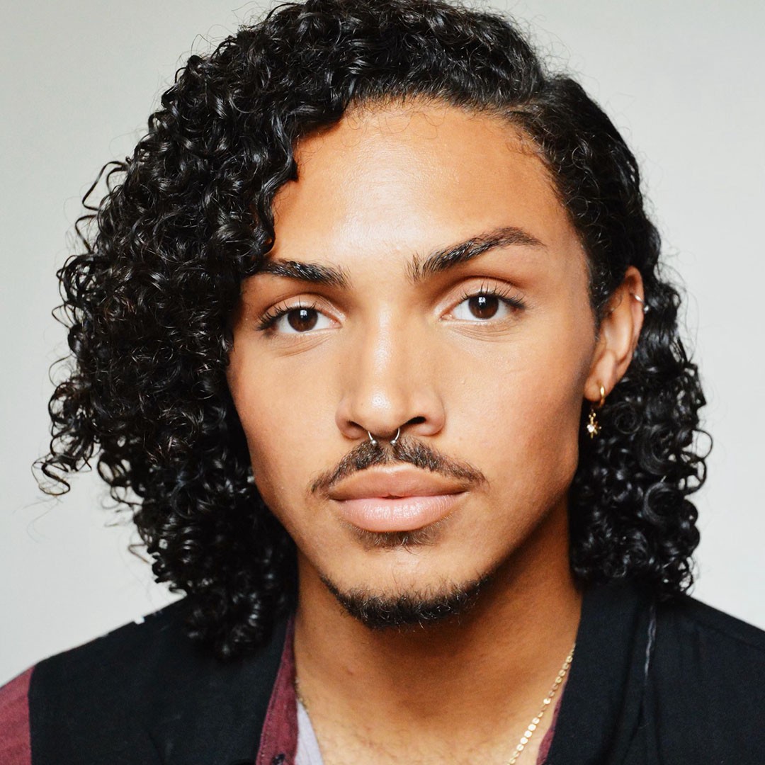 A portrait of Christian Kidd